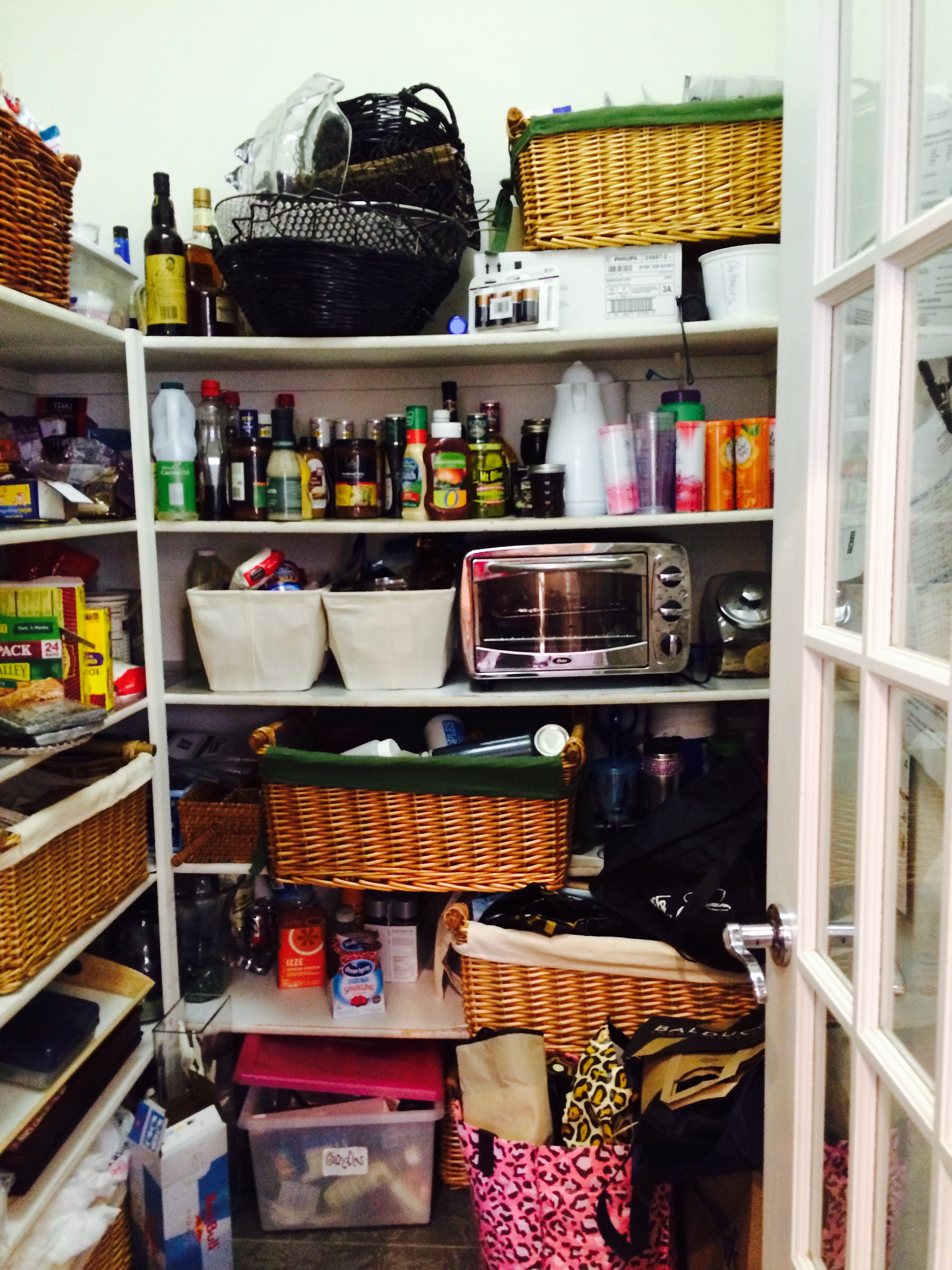 Kitchen pantry before organization side one